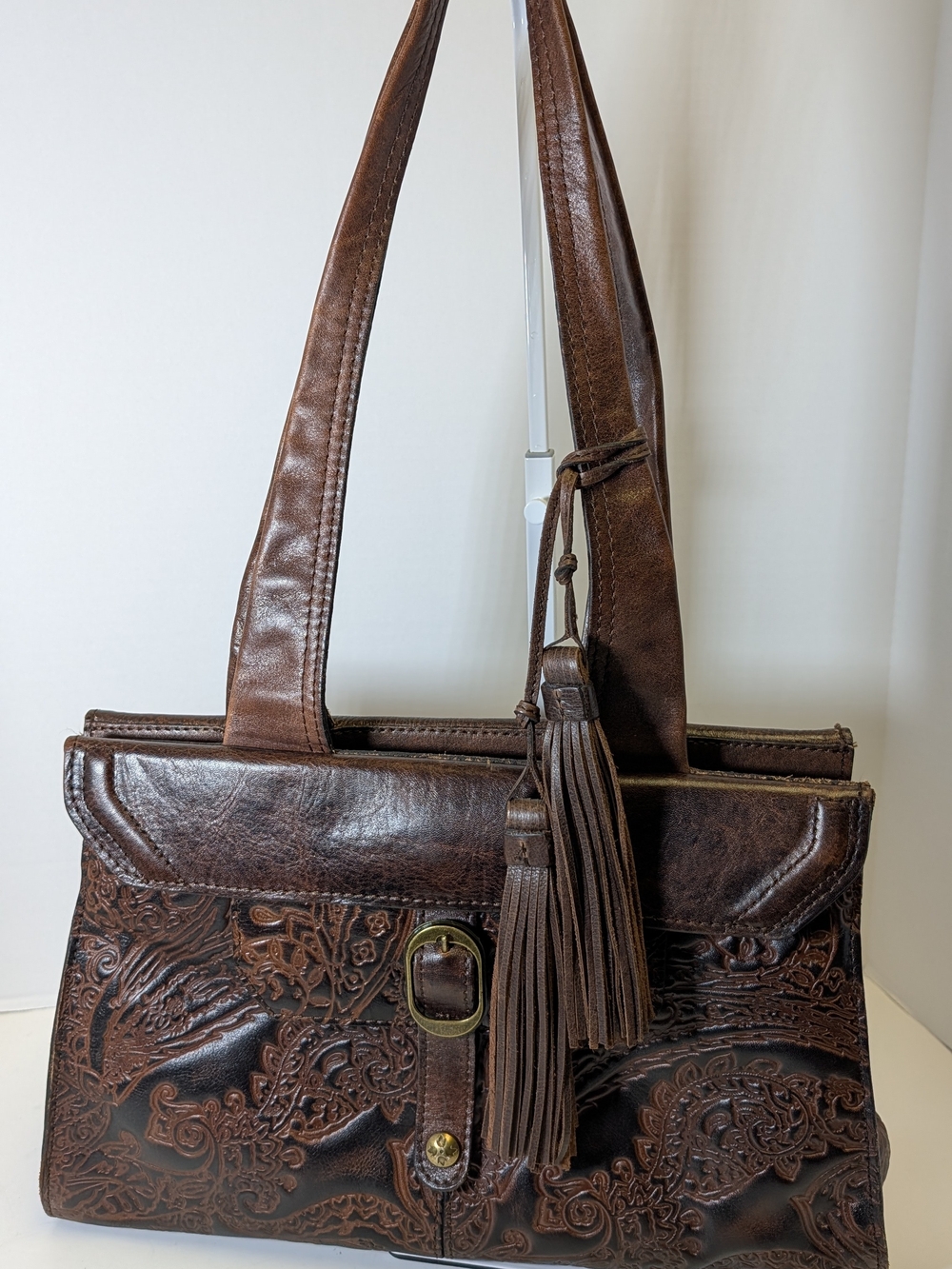 Patricia Nash Brown Tooled Leather Shoulder Bag with Tassel Accent